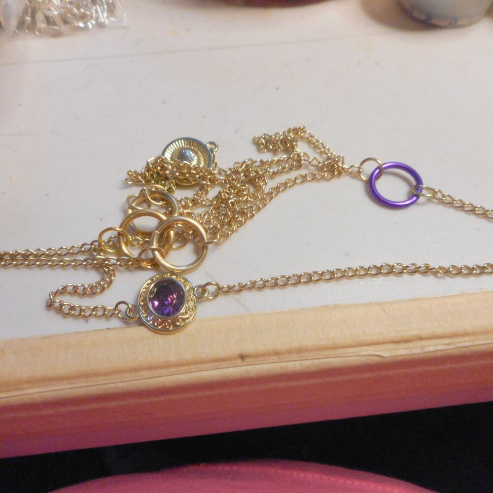 purple and gold metal ... necklace, chain with purple rings and gold rings